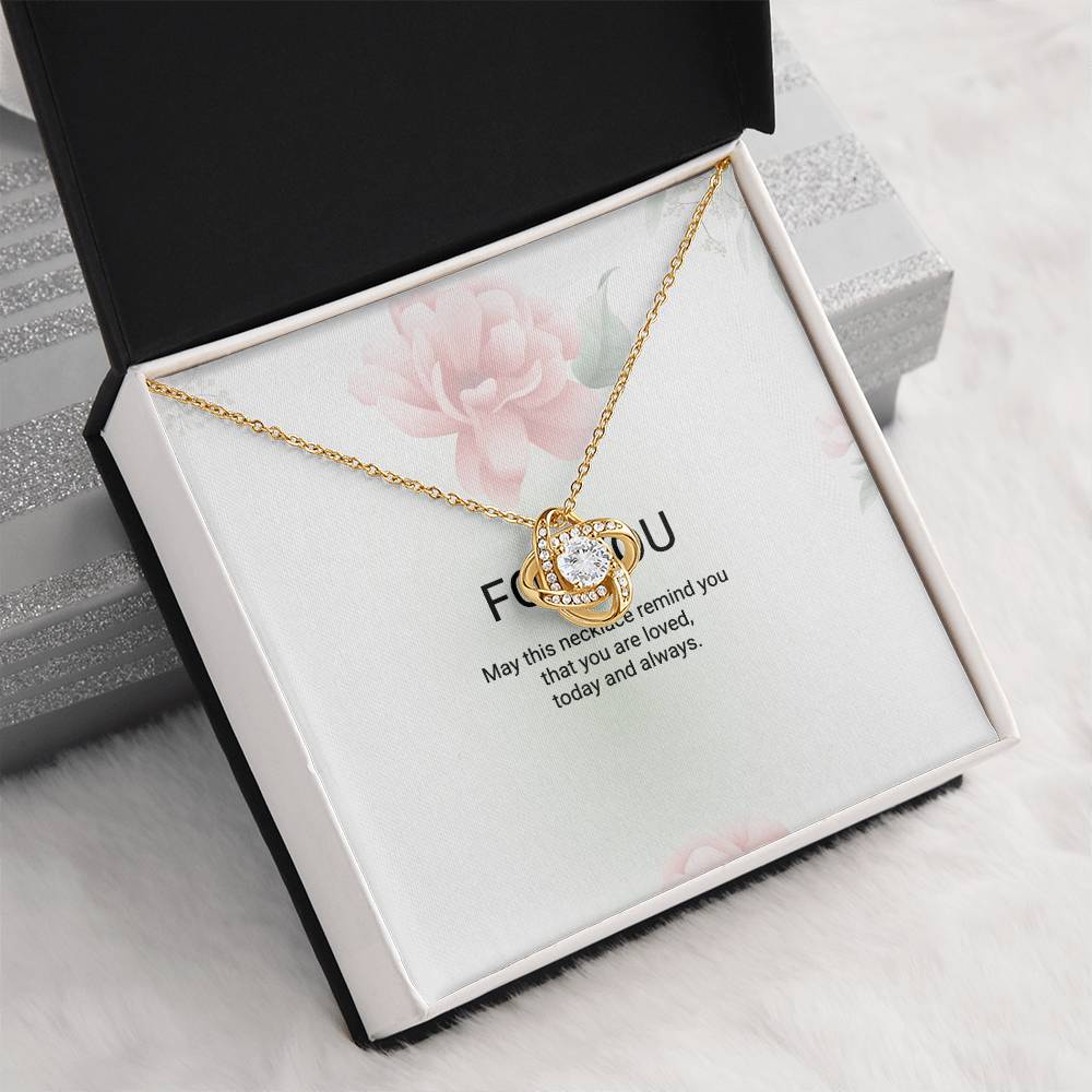 Love Knot pendant and adjustable chain detail